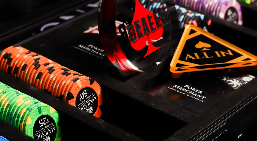 Open poker set in a black case with clay poker chips, a dealer button and an all-in button