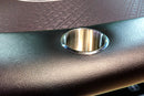 drink cups in the leather edge of a poker table
