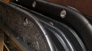 leather edges of folded poker table
