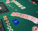 empire poker chips on a poker table