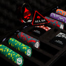 Poker chips with various designs and colors in a display case, featuring branded elements.